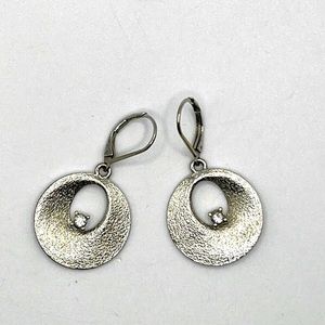 VINTAGE Monet Signed Circular
Silver Toned Earrings With‎ Cubic Zirconia Center